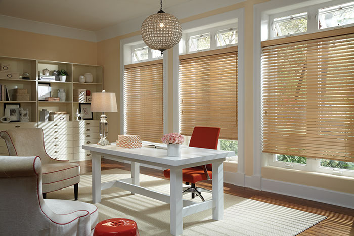 Wood blinds in a home office